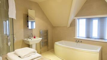 Apartment | Bathroom | Separate bathtub and shower, deep-soaking bathtub, hair dryer, towels