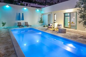 Outdoor pool, pool umbrellas, pool loungers