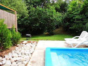Outdoor pool, pool umbrellas, pool loungers