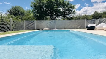 Outdoor pool, pool umbrellas, pool loungers