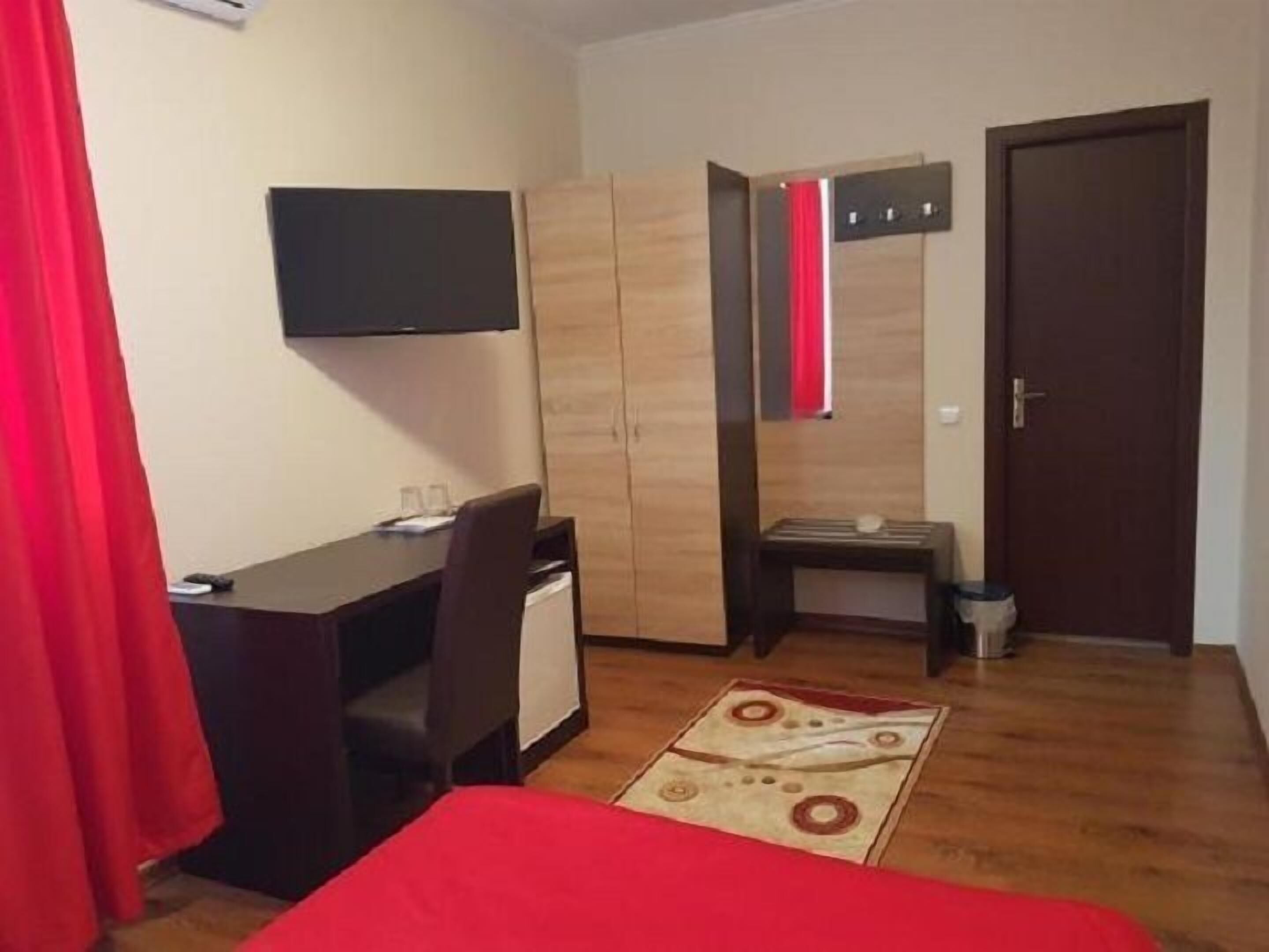 Desk, blackout drapes, soundproofing, iron/ironing board