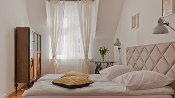 2 habitaciones, tabla de planchar con plancha, cunas y wifi gratis