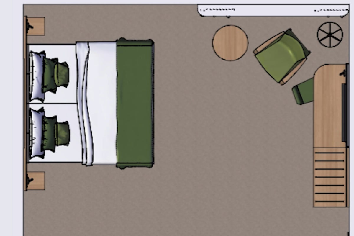 Une pièce comprenant un lit, une petite table, une chaise et une armoire.