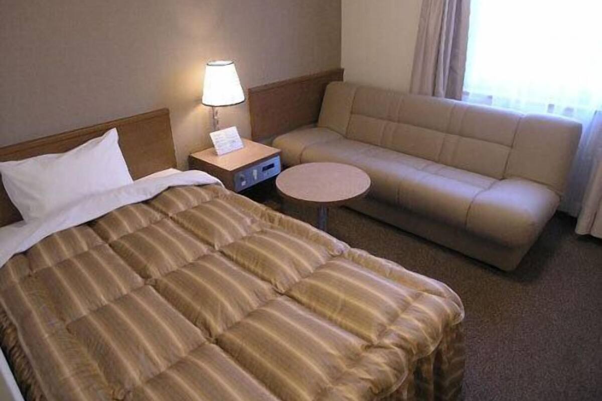 Desk, laptop workspace, blackout curtains, free WiFi