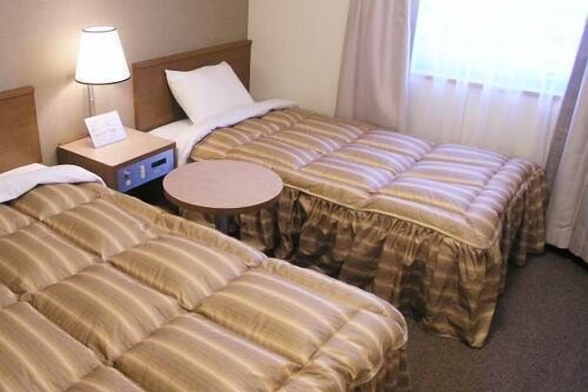 Desk, laptop workspace, blackout curtains, free WiFi
