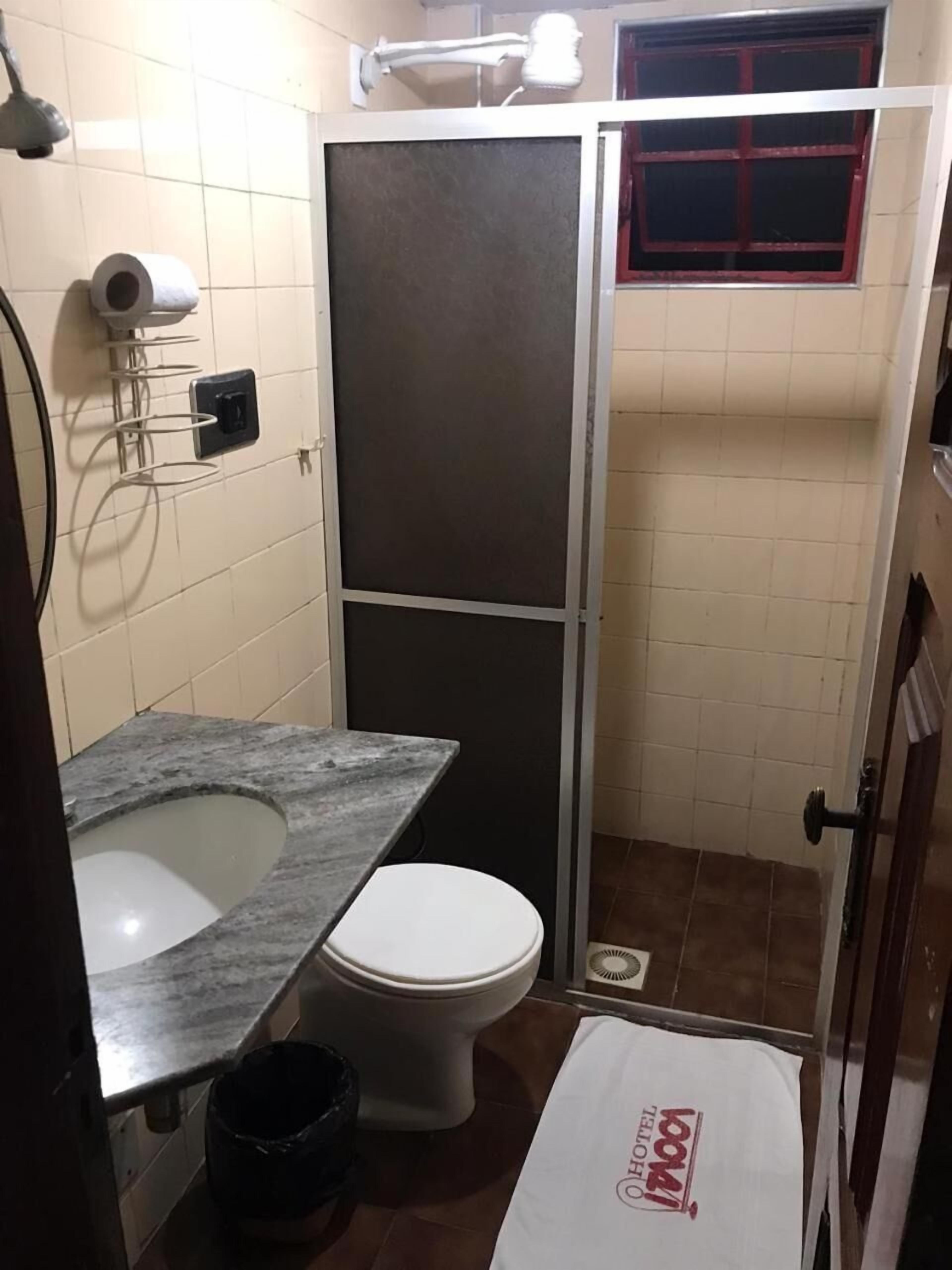 shower, towels, soap, toilet paper