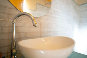 Shower, rainfall showerhead, hair dryer, towels