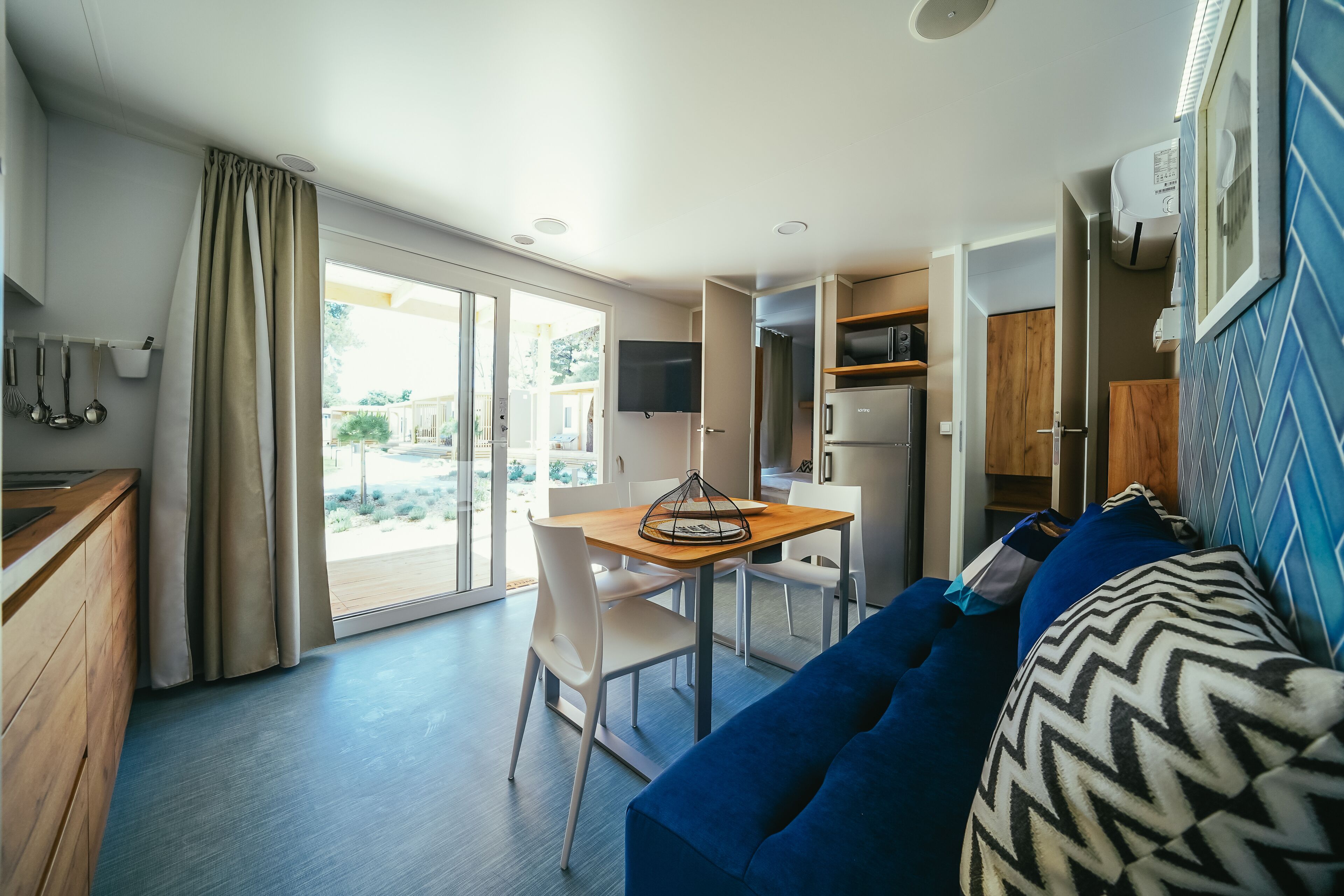 Premium Mobile Home, 2 Bedrooms, Terrace | Living area | Flat-screen TV, MP3 dock