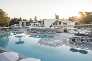 Seasonal outdoor pool, pool umbrellas, pool loungers