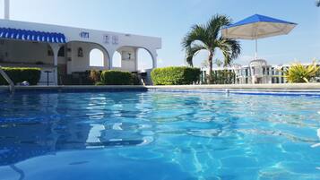 Outdoor pool, open 10:00 AM to 5:30 PM, pool umbrellas, sun loungers