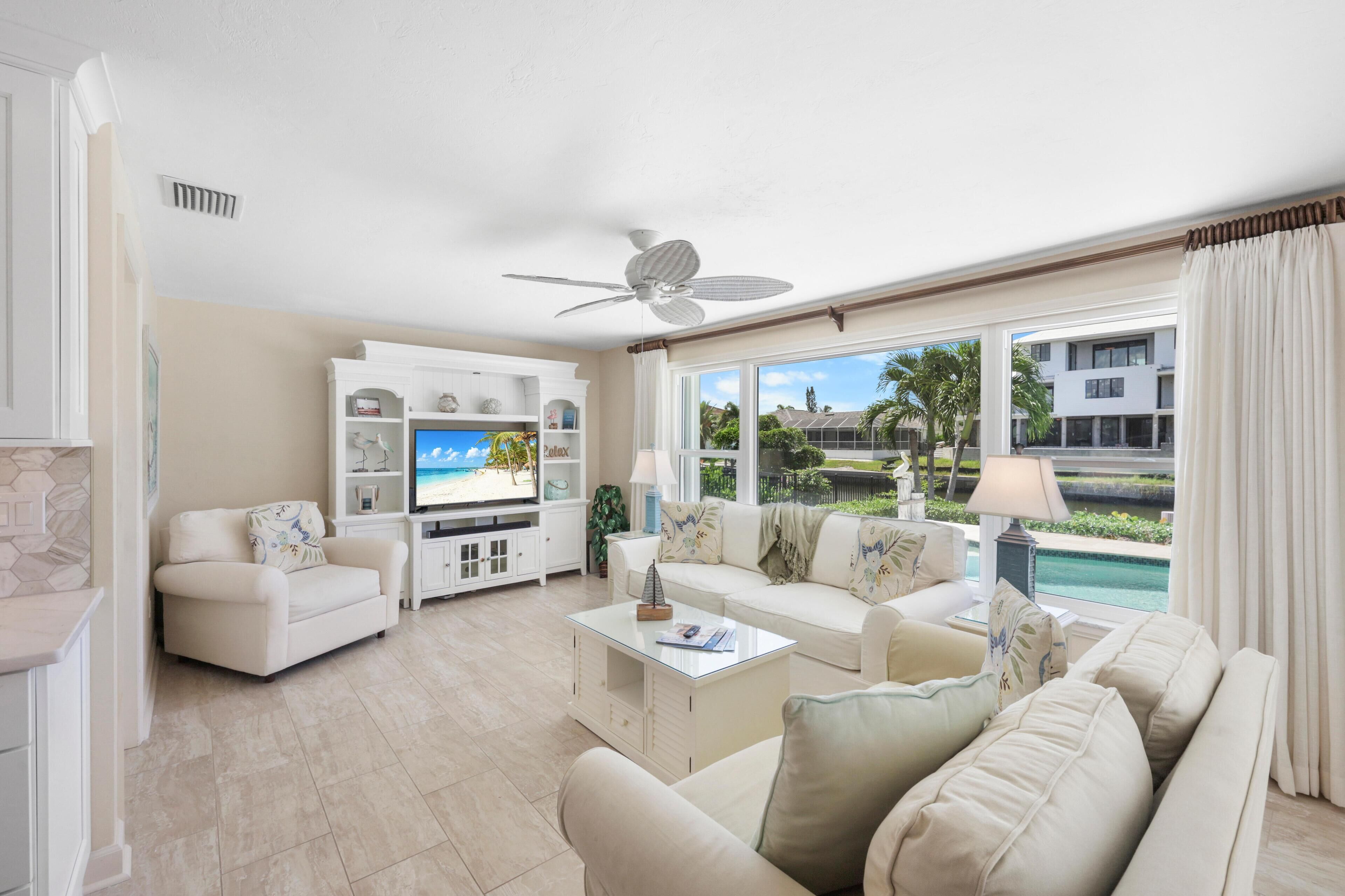 House, 1 King Bed with Sofa bed (Inviting waterfront home with western) | Living area | Flat-screen TV