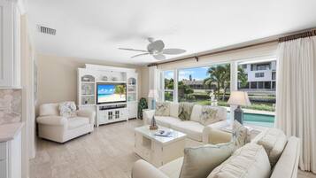 House, 1 King Bed with Sofa bed (Inviting waterfront home with western) | Living area | Flat-screen TV