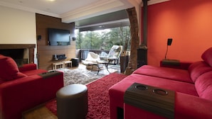 Apartamento, várias camas | Área de estar