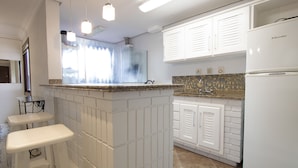 Apartamento, várias camas | Cozinha privada