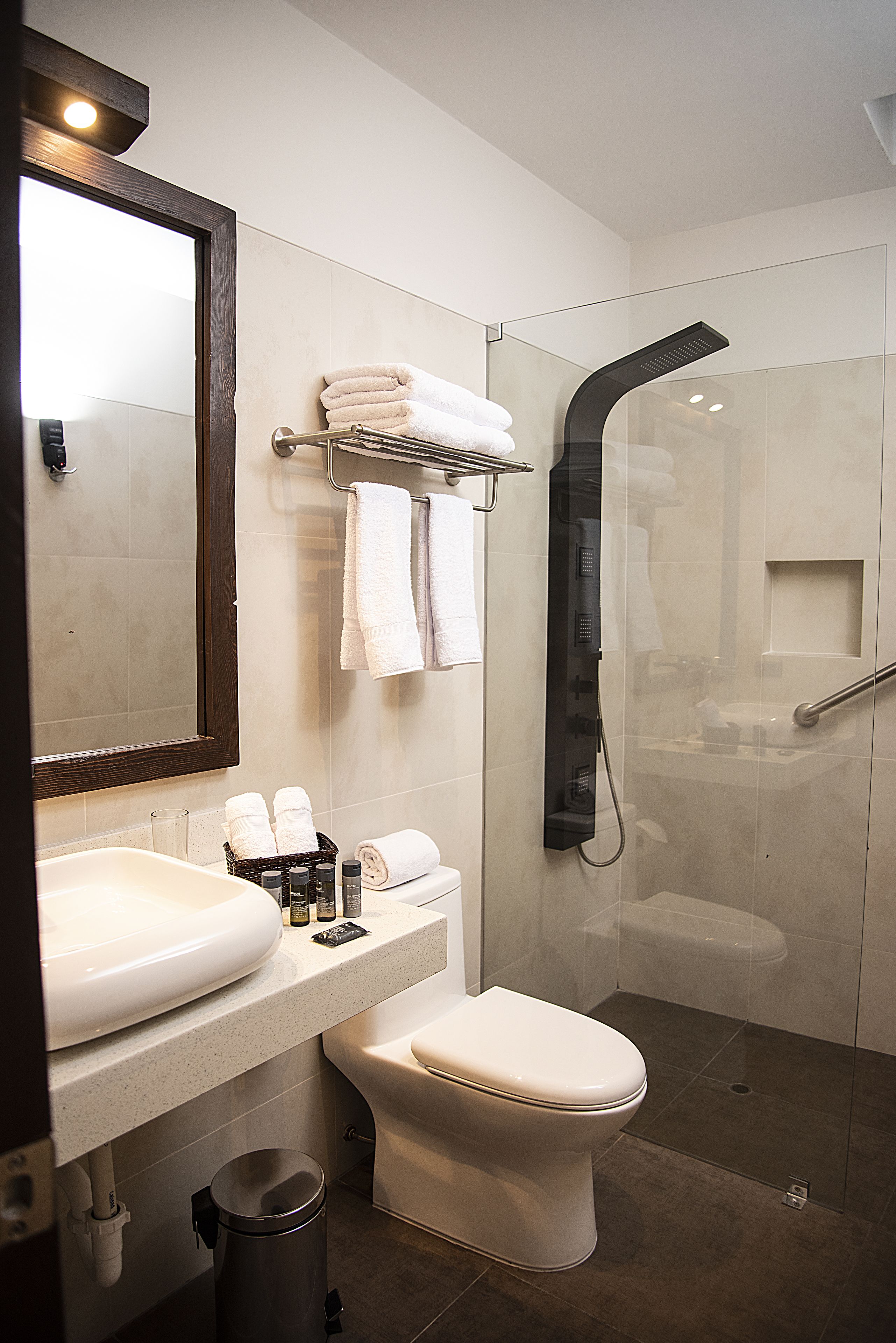 junior suite with terrace | bathroom | shower, hair dryer, towels, soap