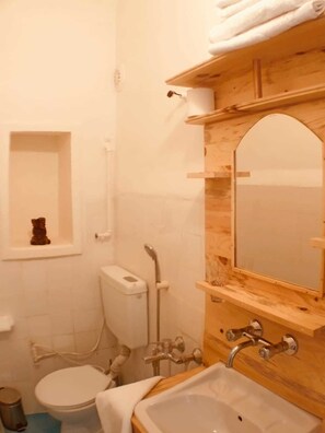 Shower, free toiletries, hair dryer, slippers