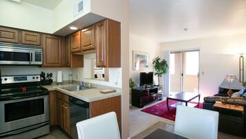 Condo, 1 Bedroom | Living area | TV, DVD player, books