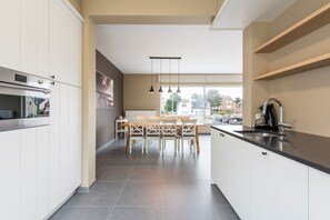 Villa, 3 Bedrooms (Koetje Boe) | Private kitchen | Full-sized fridge, microwave, oven, stovetop