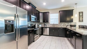 House, Multiple Beds | Private kitchen