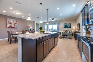 House, Multiple Beds | Private kitchen