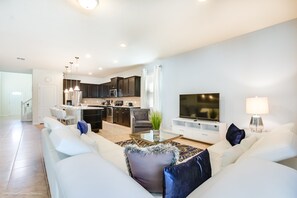 Casa, varias camas | Área de sala de estar