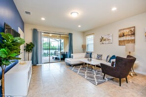 House, Multiple Beds | Living area | Flat-screen TV