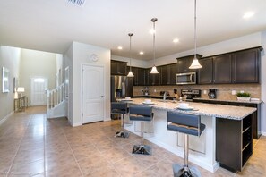 House, Multiple Beds | Private kitchen