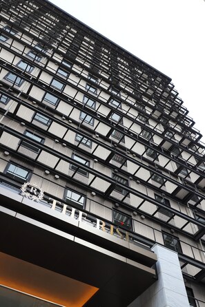A modern building with a grid of windows and balconies. - The Rise Osaka Kitashinchi (Osaka)