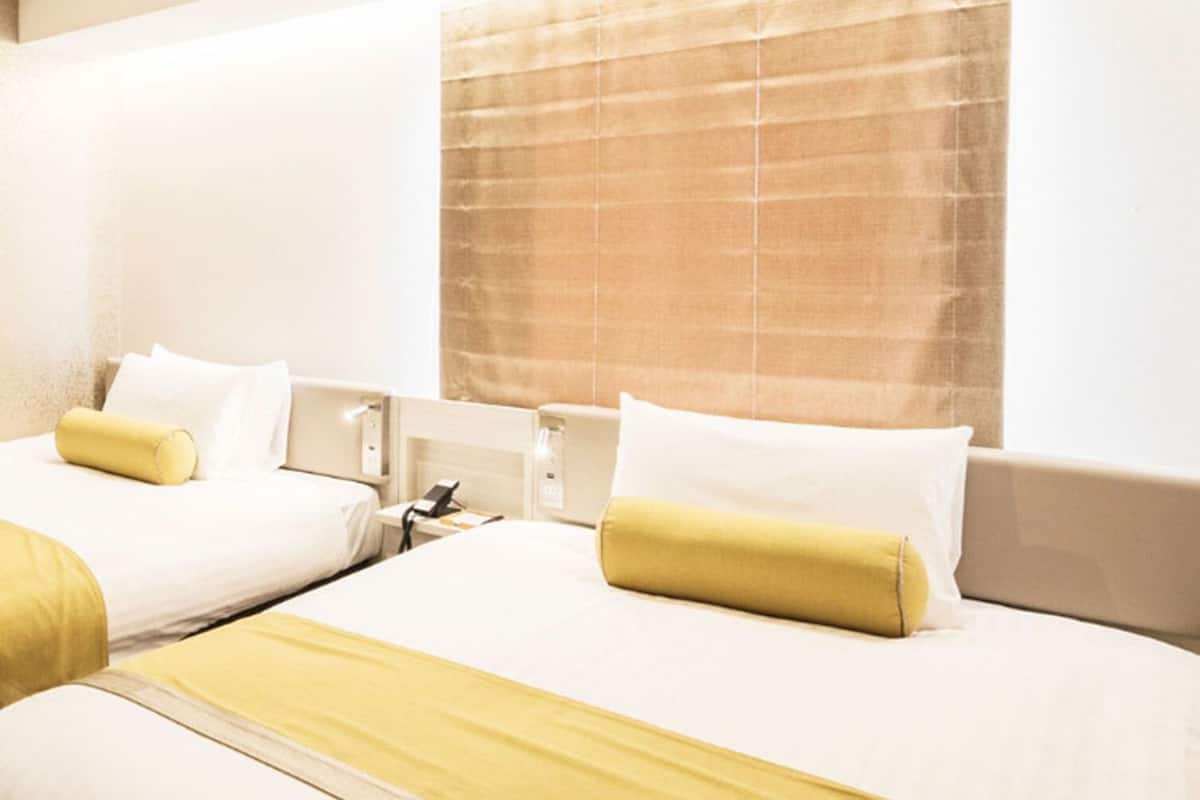 Roupas de cama premium, quartos à prova de som, Wi-Fi de cortesia