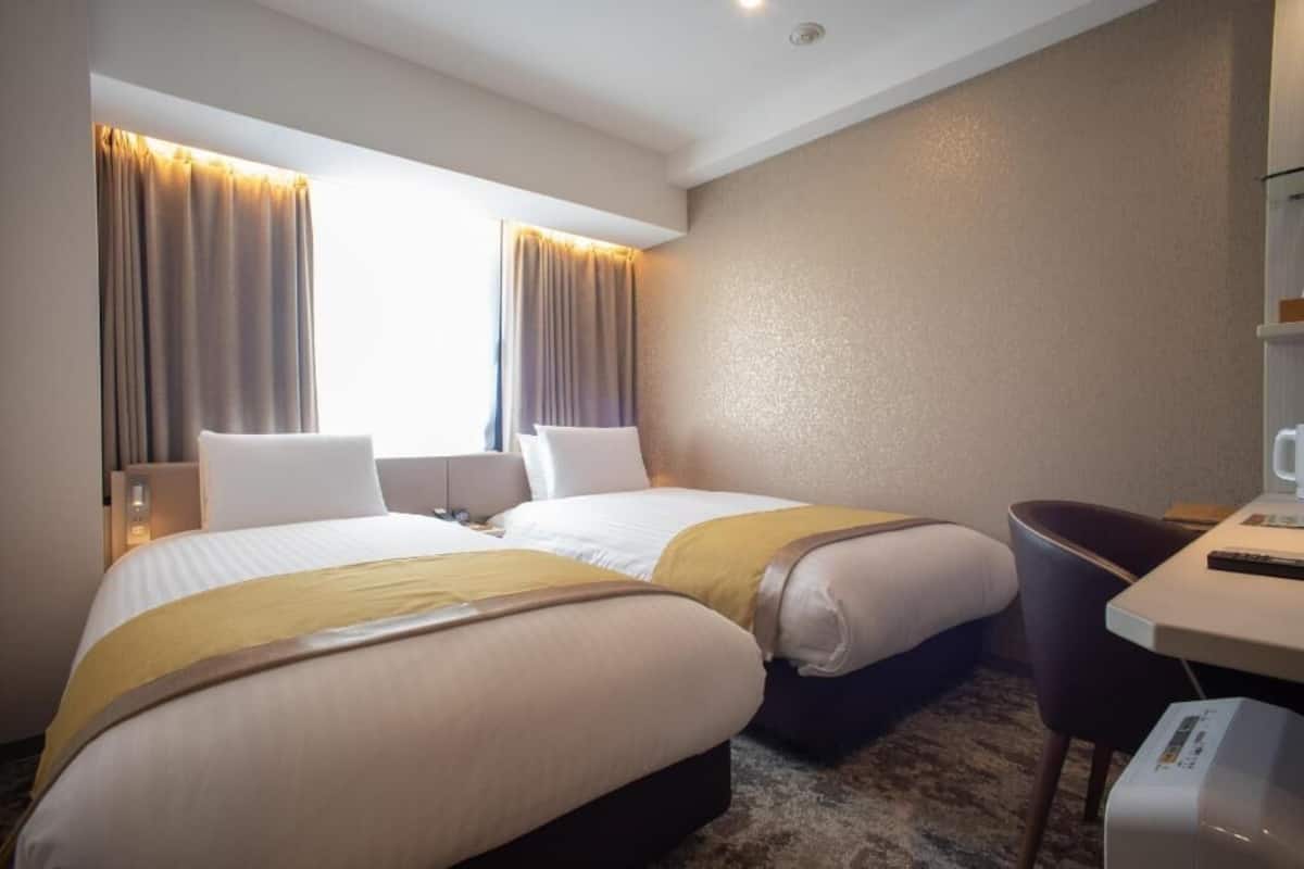 Roupas de cama premium, quartos à prova de som, Wi-Fi de cortesia