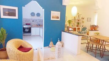 Family Apartment, 2 Bedrooms | Living area | 32-inch flat-screen TV with satellite channels, TV