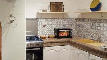Apartemen Desain, 2 kamar tidur | Dapur pribadi | Lemari es, oven, kompor, dan ketel listrik