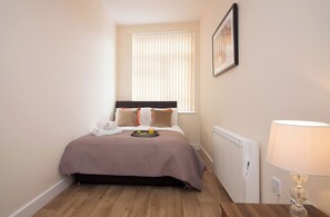 2 chambres, fer et planche à repasser, accès au Wi-Fi (inclus)