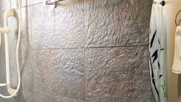 Family Quadruple Room | Bathroom | Shower, free toiletries, hair dryer, slippers