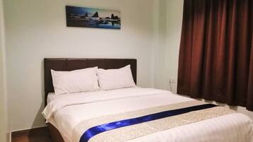 Desk, blackout curtains, iron/ironing board, bed sheets