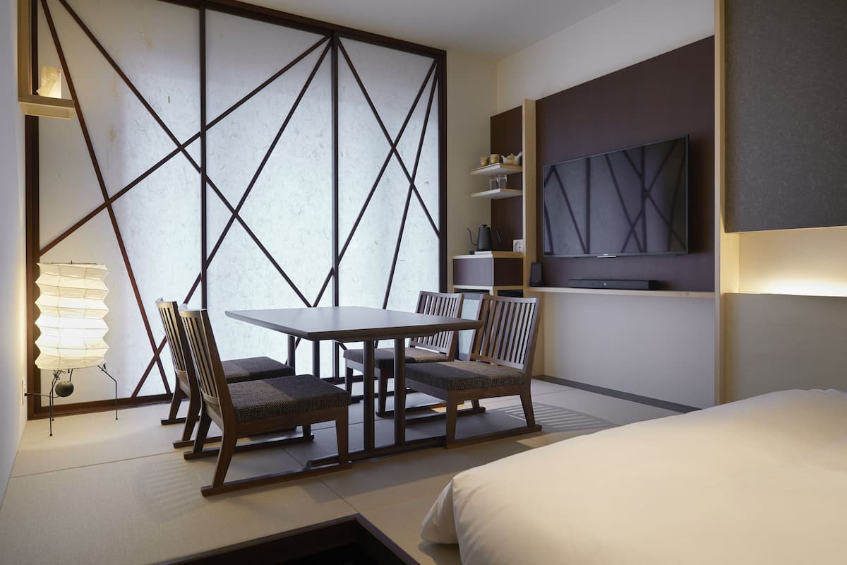 family room | 1 bedroom, down duvets, in-room safe, desk