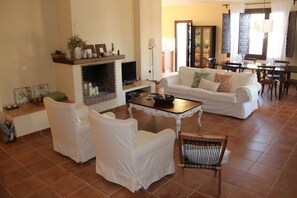 TV, fireplace, books, stereo