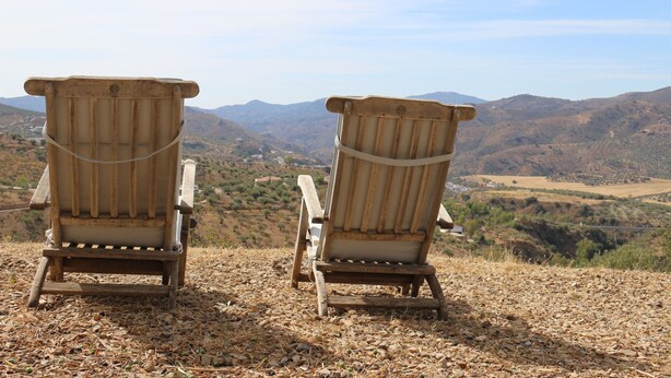 Two wooden Adirondack chairs facing a mountainous landscape. - Rural villa in Marrucho Alto (Riogordo)
