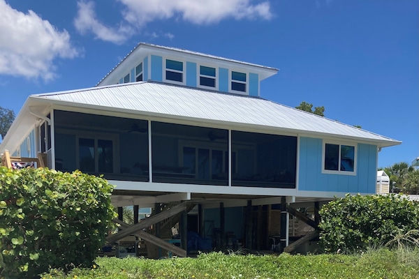 Front of the home, stairs to enter the main area