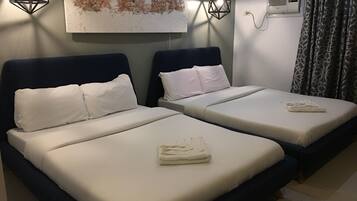 Kamar Keluarga, kamar mandi pribadi (Aircon) | 1 kamar tidur, tirai kedap cahaya, dan kedap suara