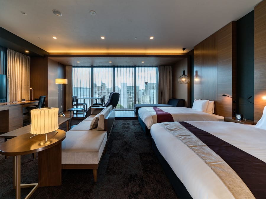 Luxe beddengoed, donsdekens, een kluis op de kamer