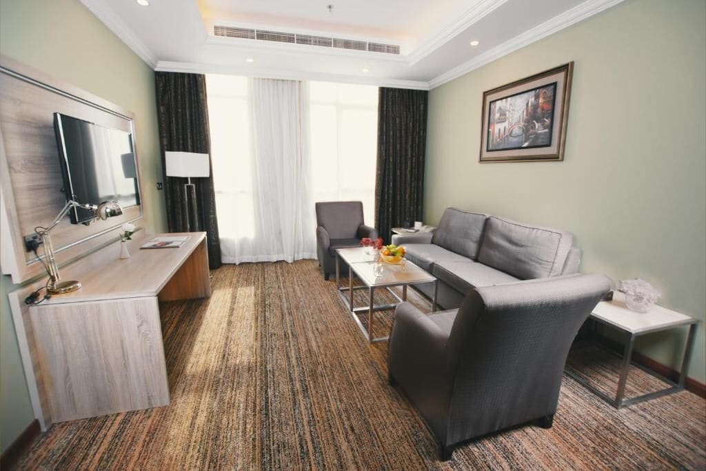 junior suite, city view | living room | lcd tv
