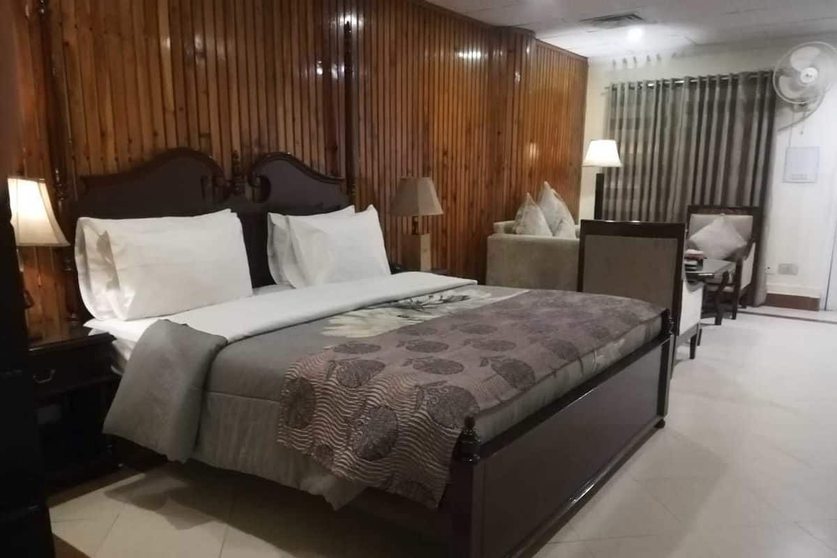 Chambre Deluxe Double ou avec lits jumeaux, dortoir mixte, fumeur, vue ville