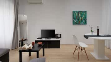 Studio Classique, vue jardin | Coin séjour