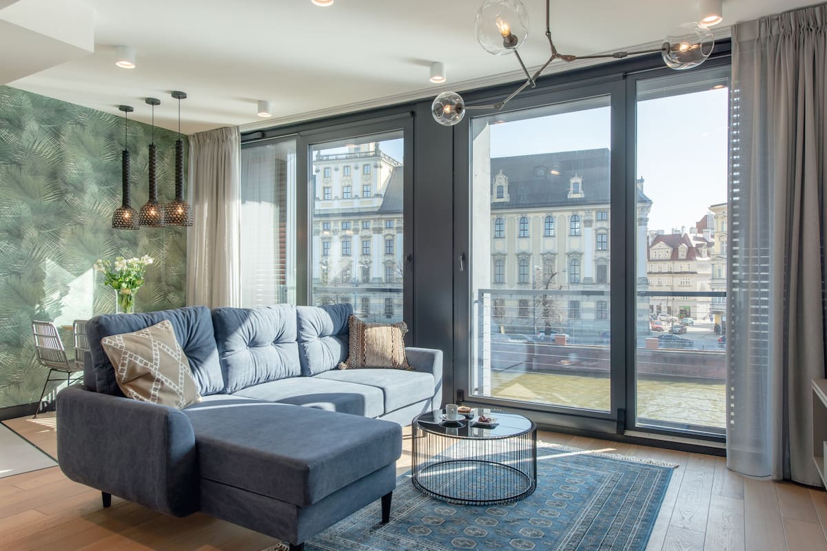 Suite Deluxe, 1 habitación, vista al río | Sala de estar | Televisión de pantalla plana y piso con calefacción