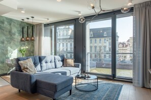 Deluxe Suite, 1 Bedroom, River View | Living room | Flat-screen TV, heated floors - inQse Wroclaw | Marina (Wroclaw)