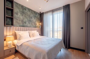 Executive Suite, 2 Bedrooms, City View | Hypo-allergenic bedding, in-room safe, individually decorated - inQse Wroclaw | Marina (Wroclaw)