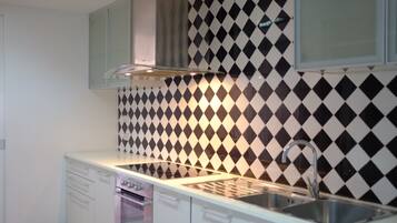 Luxury Duplex, City View | Private kitchen | Full-size fridge, microwave, cookware/dishes/utensils