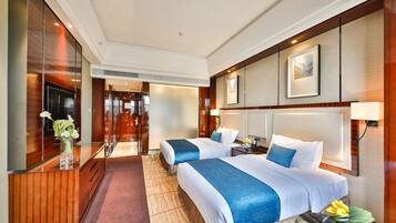 Premium bedding, down comforters, in-room safe, desk