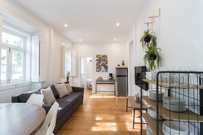 Apartamento | Área de estar | TV de plasma